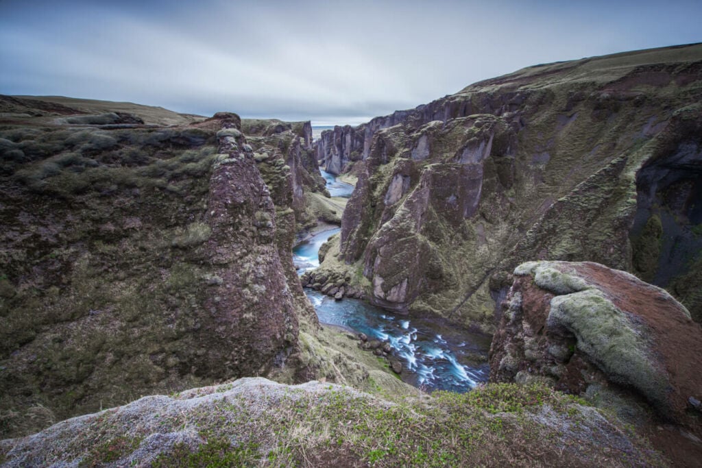 Ledge above the most famous canyon of iceland on a cloudy day