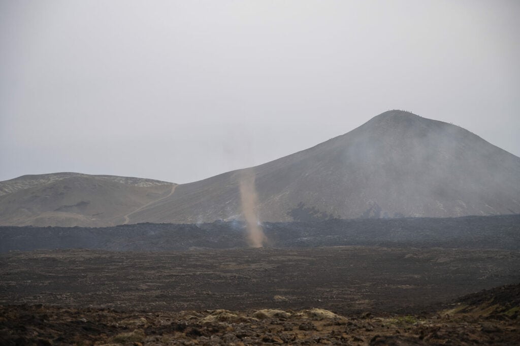 Dust davil on a lava field at the 2023 fagradalsfjall eruption by litl-hrutur.