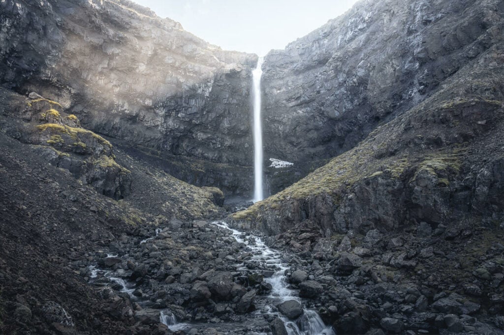 Flogufoss a waterfall that falls into a wide gorge