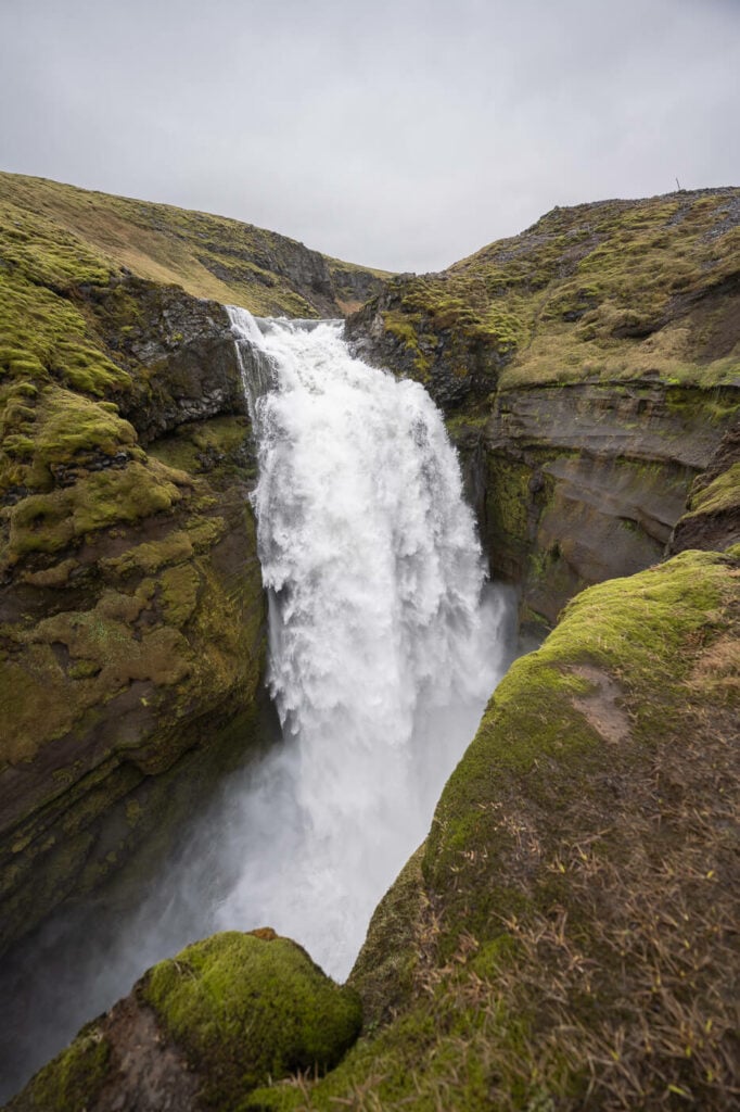  Króksfoss an impressive waterfall on the Skogafoss waterfall way on a cloudy day.