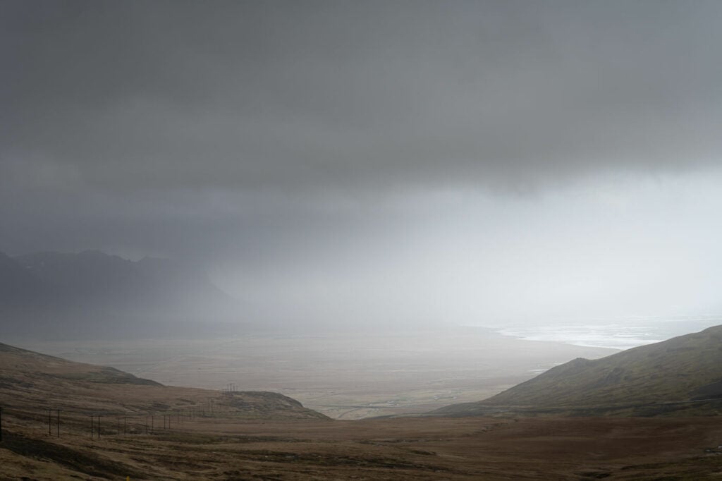 Darm and gloomy landscape on the Snaefelsness peninsula during a camper van road trip in Iceland