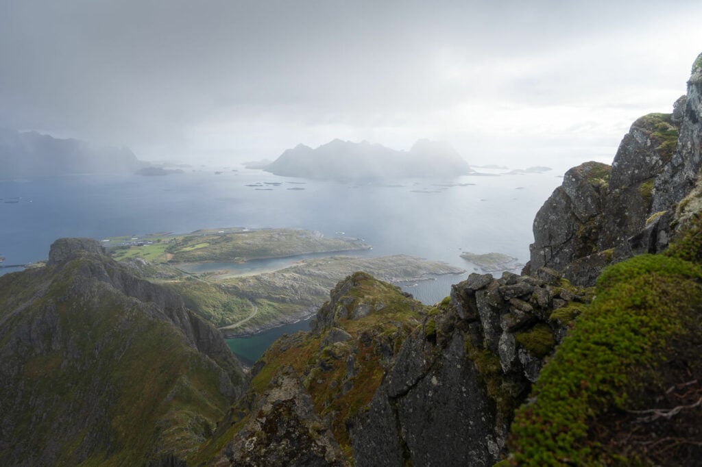 misty panoramic viewof countains and the sea in northern norway