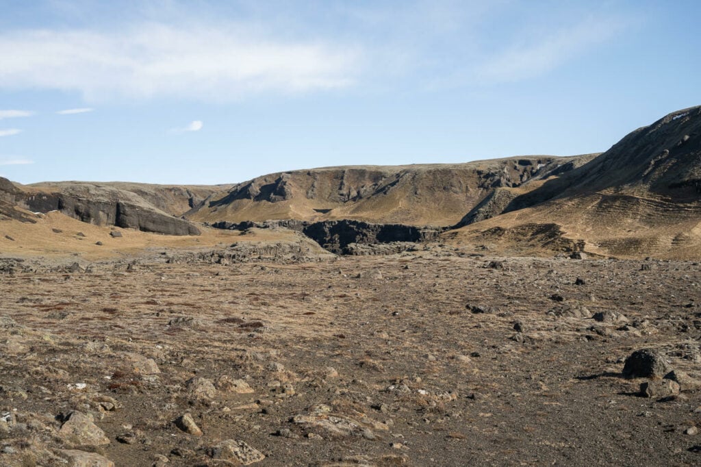 image of some badlands in Iceland with brown grass typical of winter