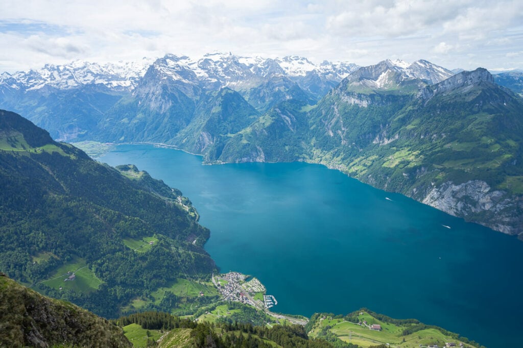 Mountains surrounding the blue waters of a lake in Switzerland