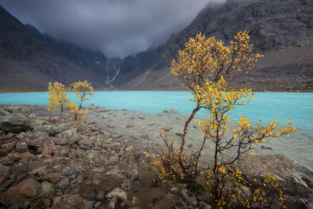 Lake with turquoise waters in the lingen alps in Norway