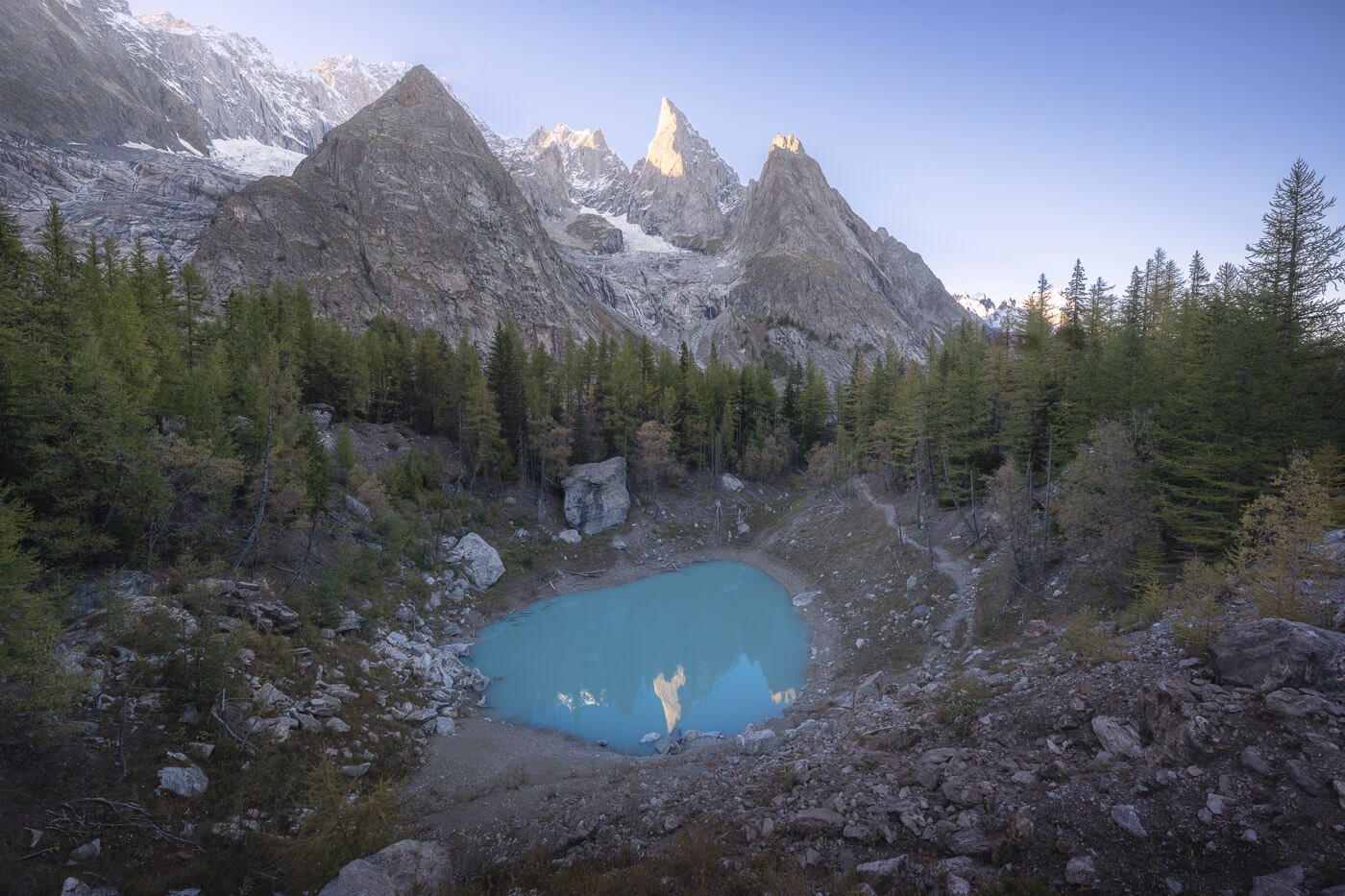 View of Lago Verde with the mont blanc massif in the background