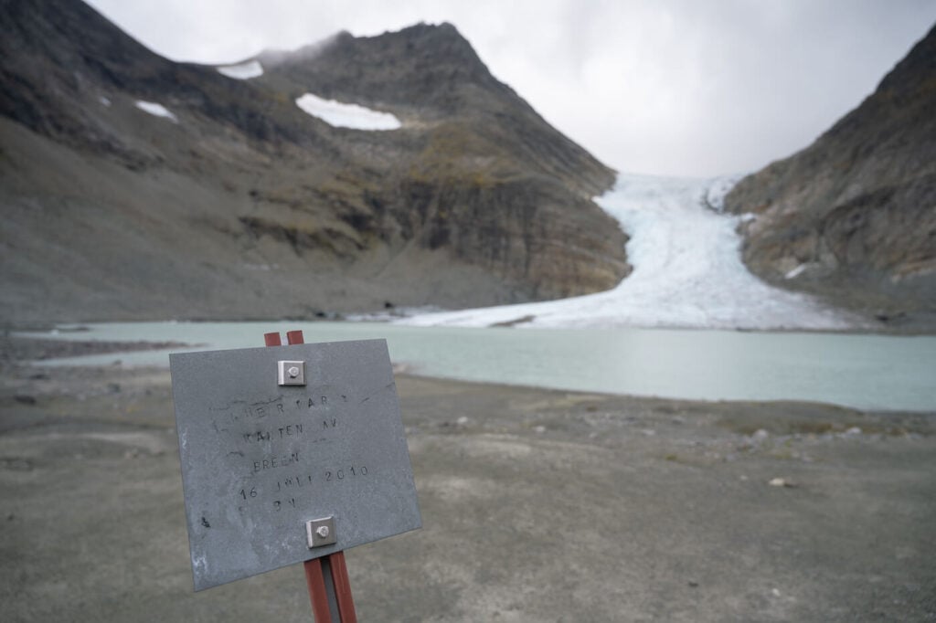 board marking the level of the Steindalsbreen glacier in previous years