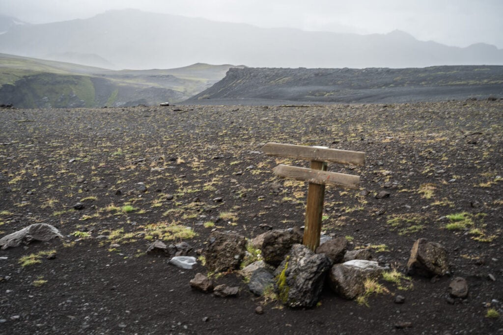 signpost in the barren landscape of the highlands of iceland.