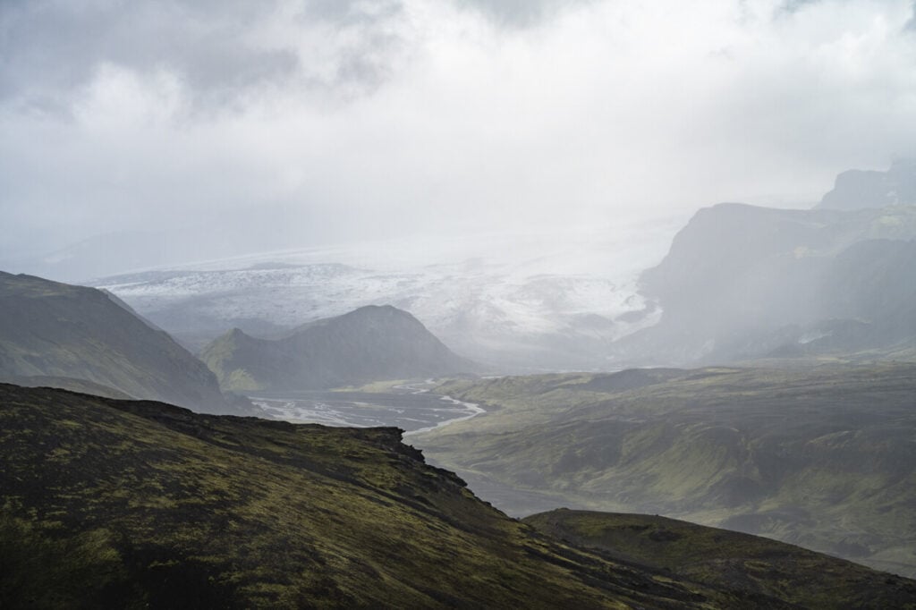 view of a glacier on a cloudy day in the highlands of Iceland.