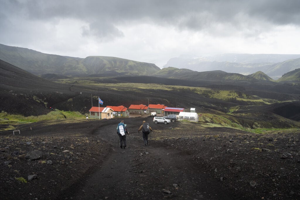 Hikers walking to toward the parking area of the Emstrur Botnar hut in Iceland