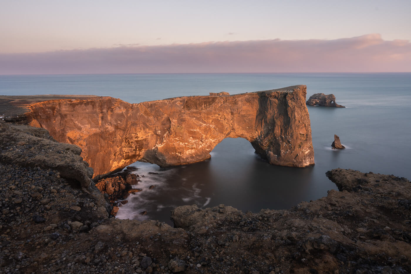 Dyrholaey arch at sunset in March