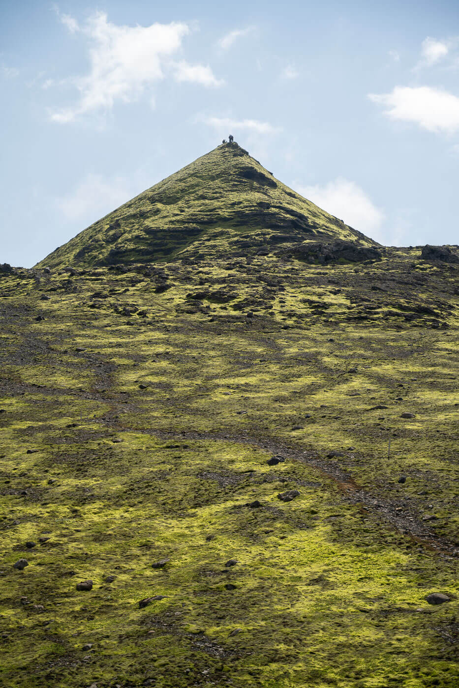 Hikers on top of a mountain called Maelifell in Thakgil along the red trail 