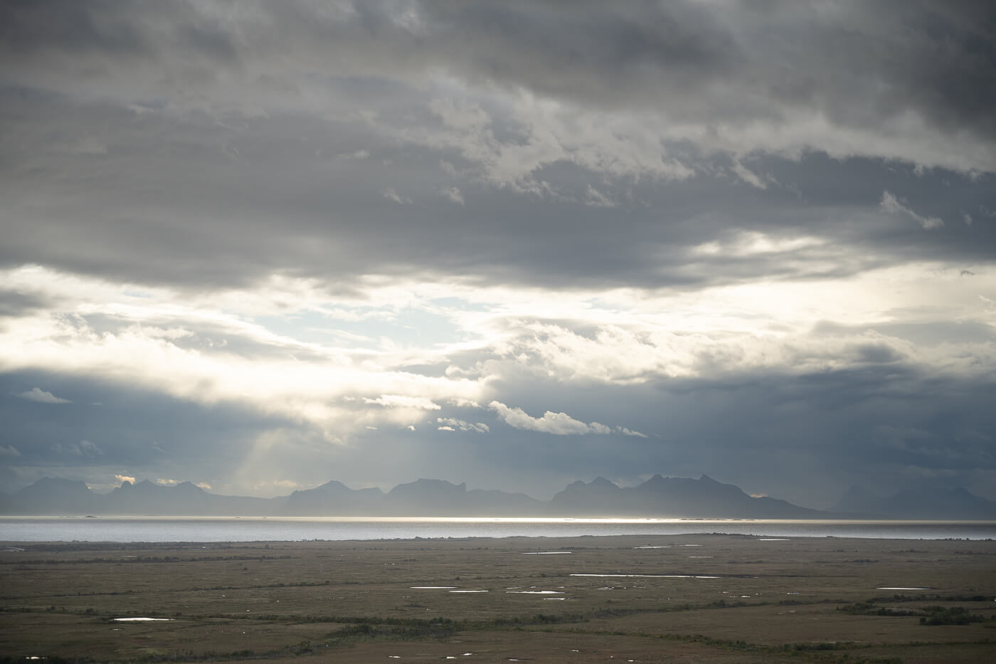 View of a dramatic sky over the fjords of northern Norway