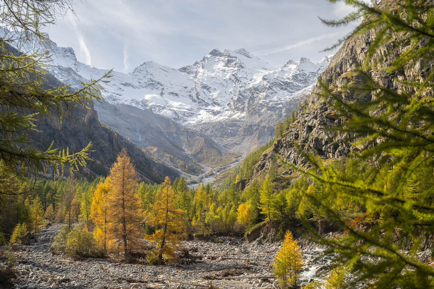 View of the Gran Paradiso massif on a sunny day from the hiking trail to Alpe Money in Valnontey,