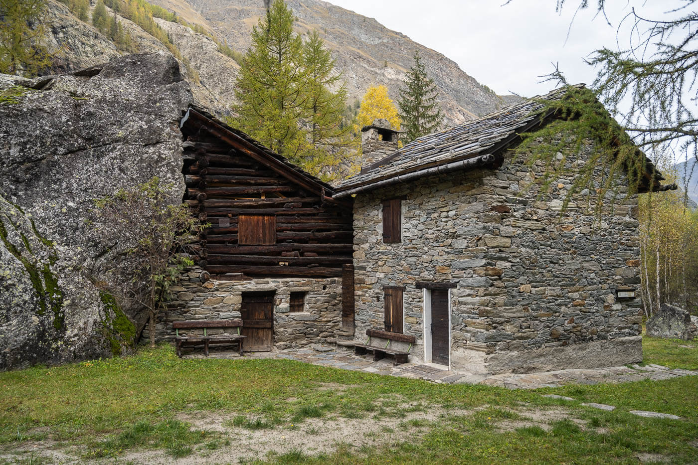 Hut partly built into. a rock in valnontey