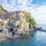 View of Manarola, a village in Le Cinque Terre with colorful houses