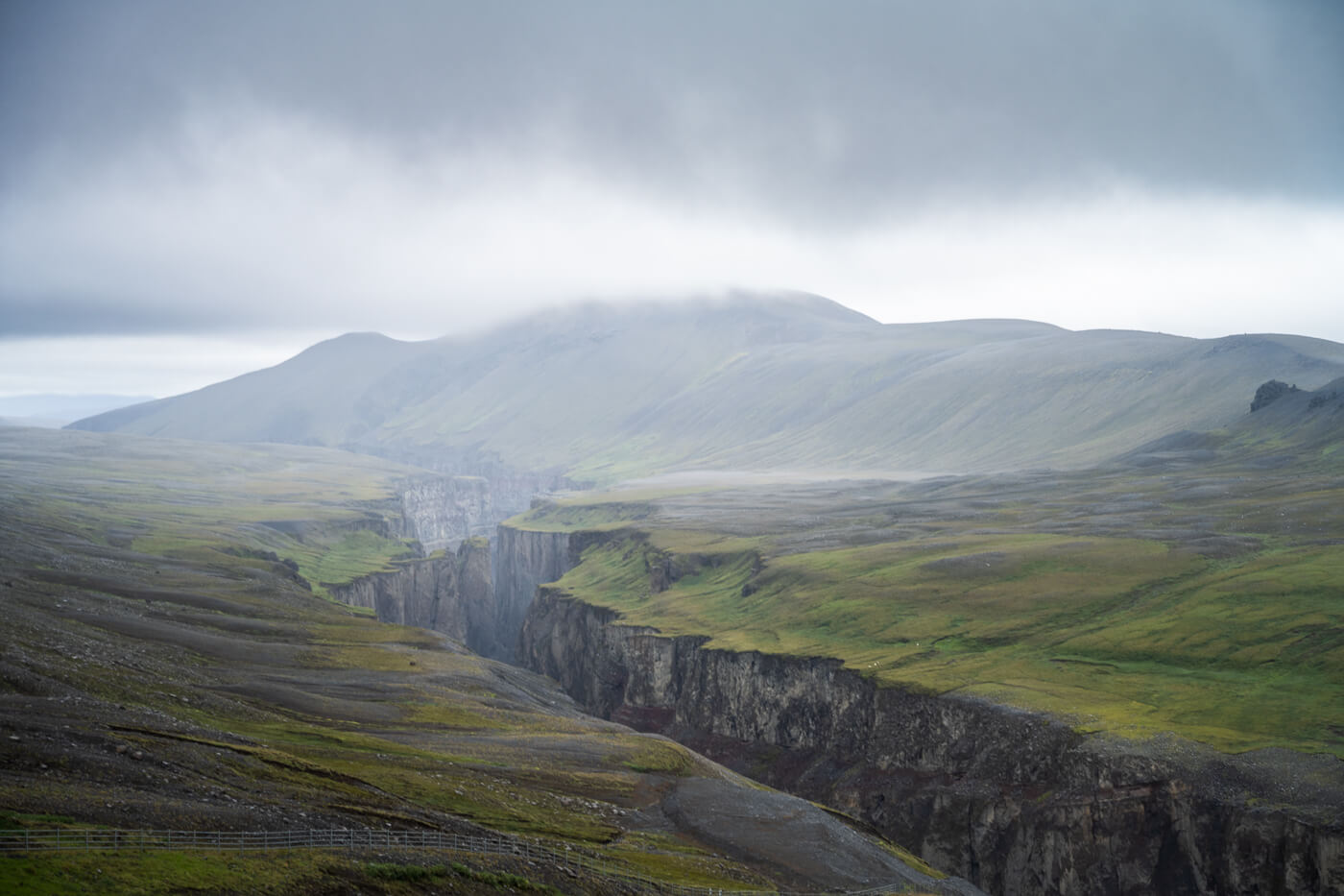 Dimmugljufur and Hafrahvammagljufur Canyons under the clouds, viewed from the Kárahnjúkar power plant's dam.