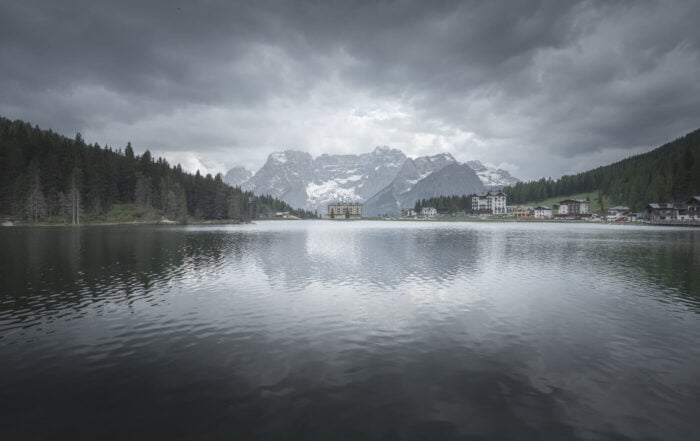 Lago di Misurina viewpoint with a view of an old sanatorium reflecting into the lake