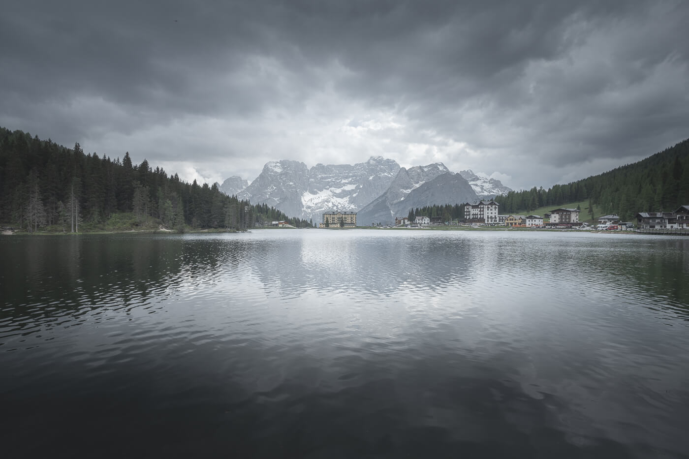 Lago di Misurina viewpoint with a view of an old sanatorium reflecting into the lake