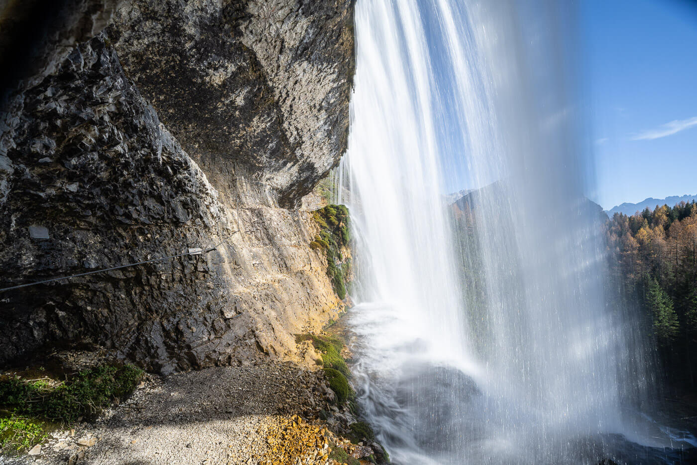 View from a waterfall you can walk behind in the Dolomites.
