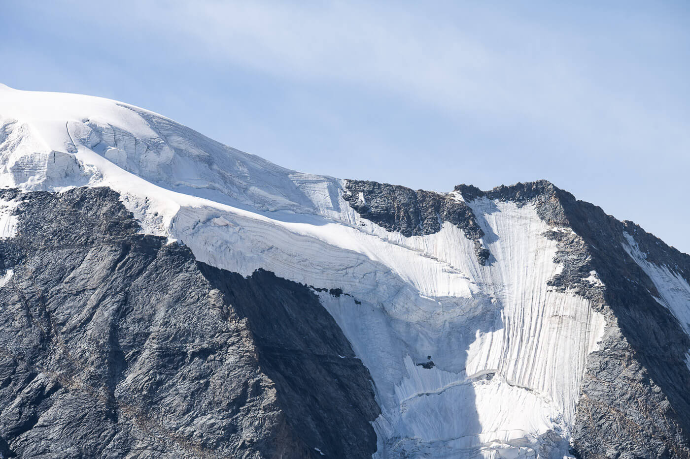 partly collapsed glacier hanging on the mountain side