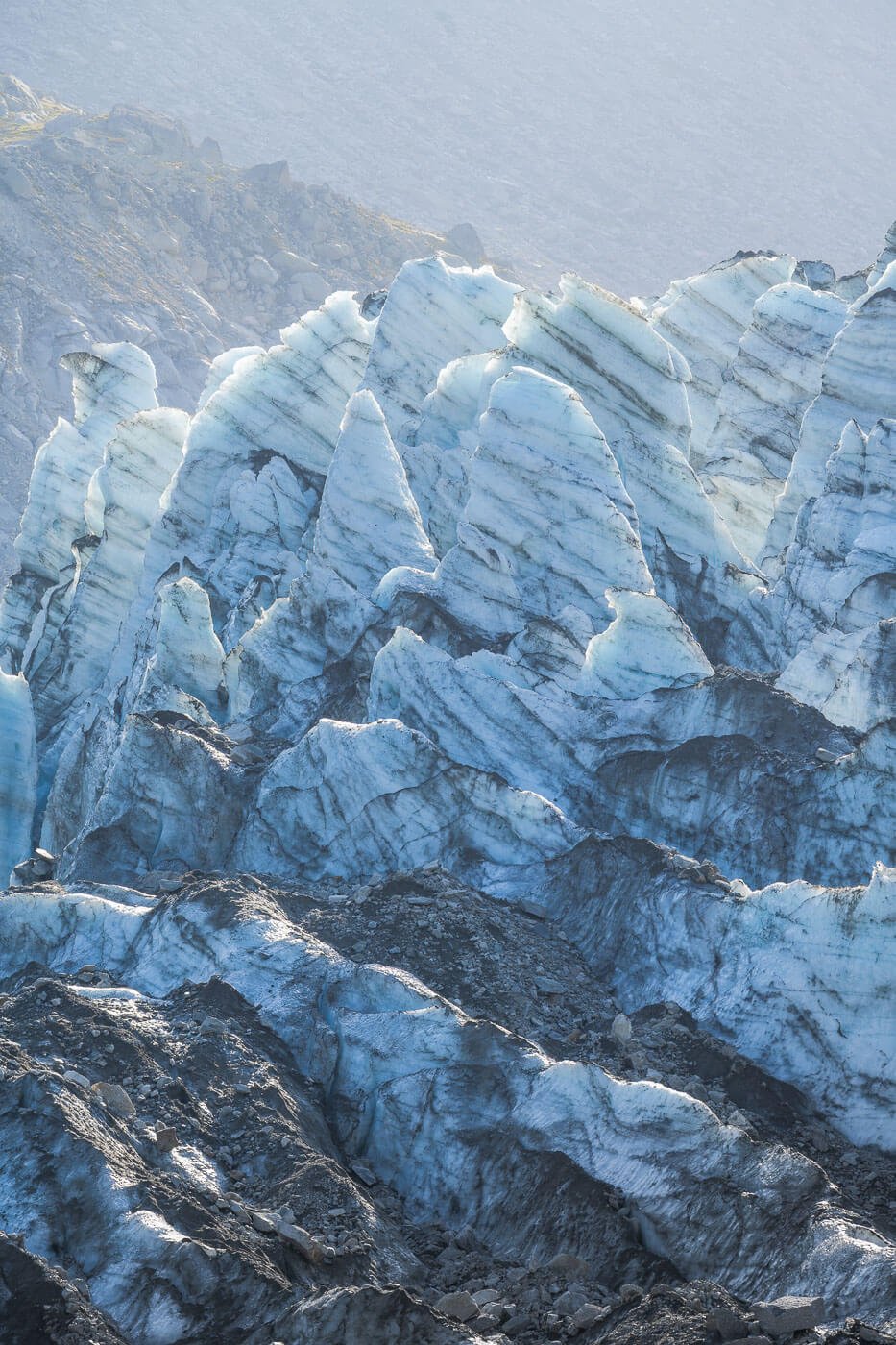 Searcs of the Le glacier d'Argentière Glacier baclit by the warm morning light