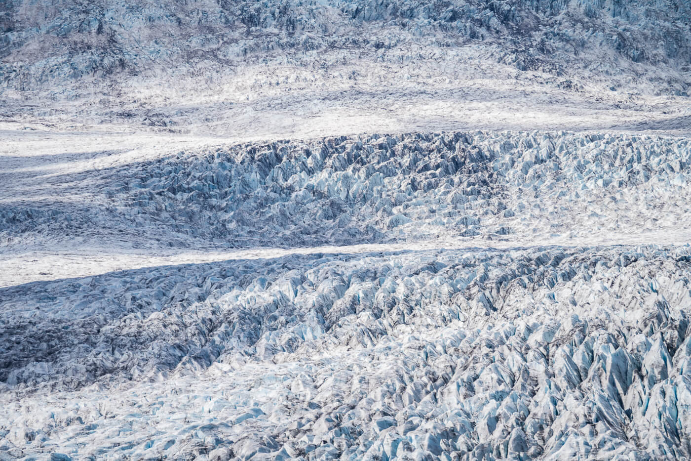 Close-up view of a vast glacier in Iceland.