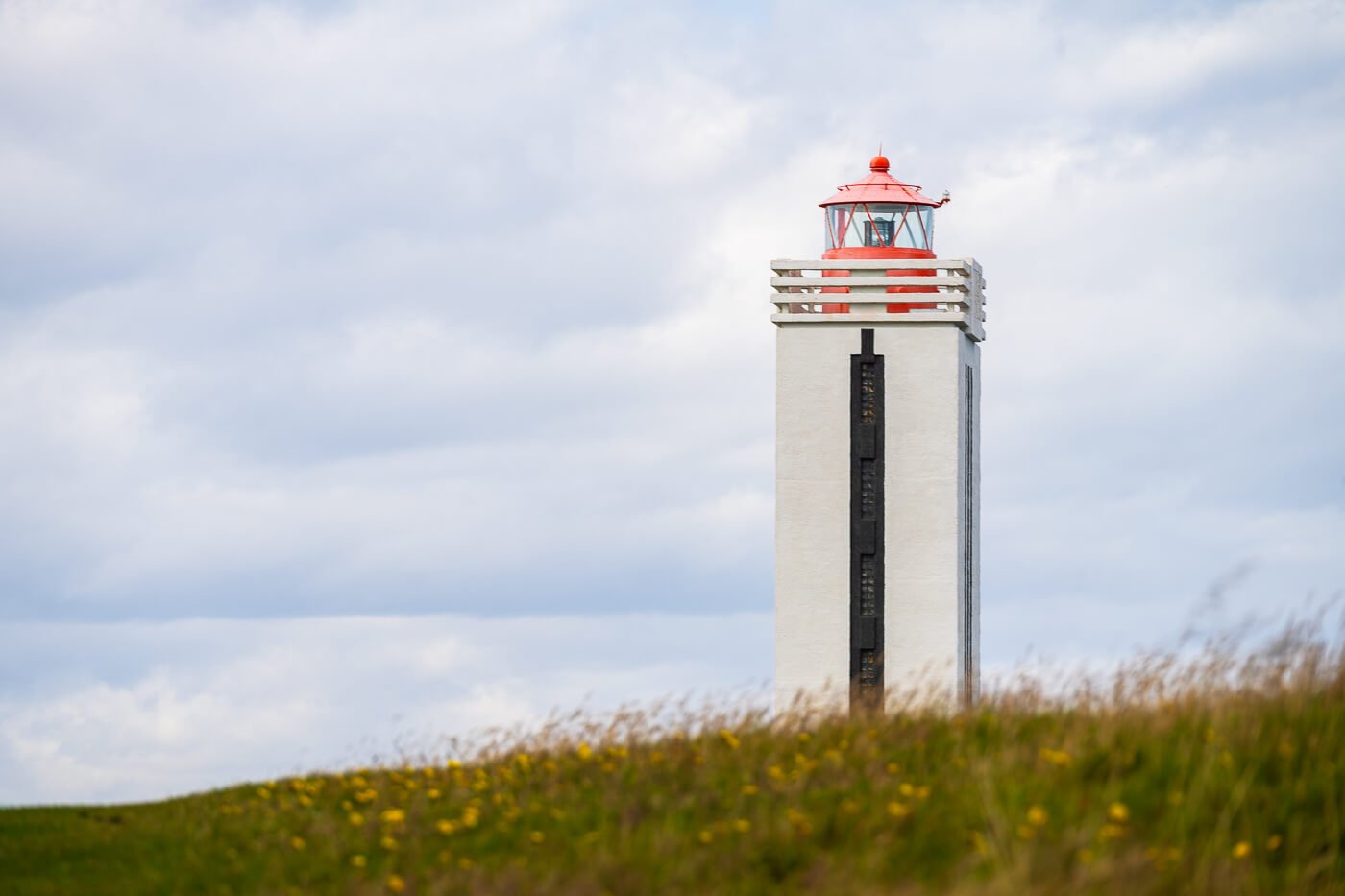 Kalfshamarsvik lighthouse photographed with a telephoto lens from Nikon.