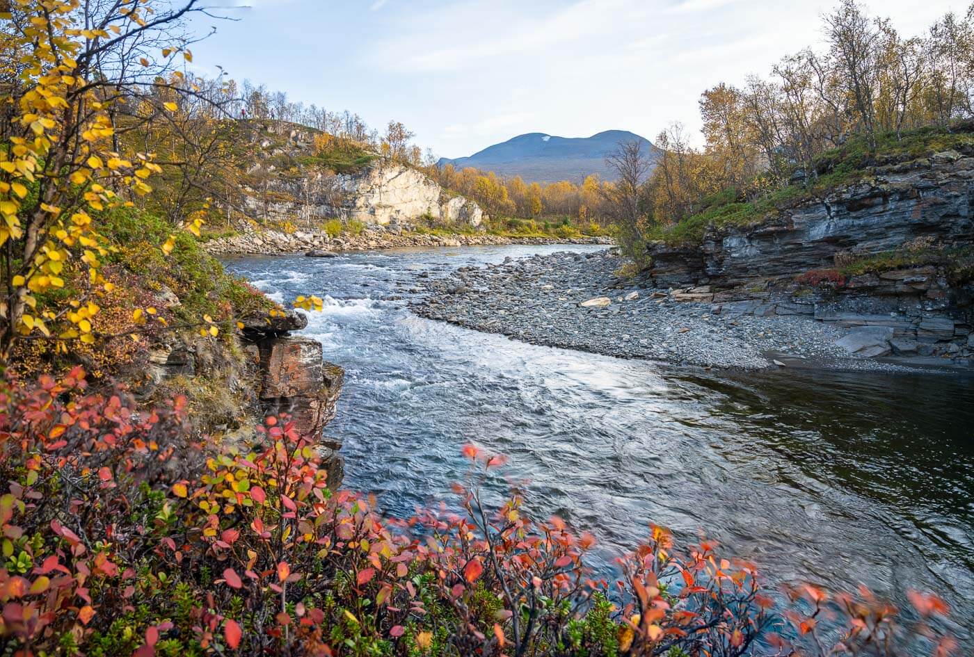 Photo of the Abiskojokk river taken during a hike on the Njakajaure Trail