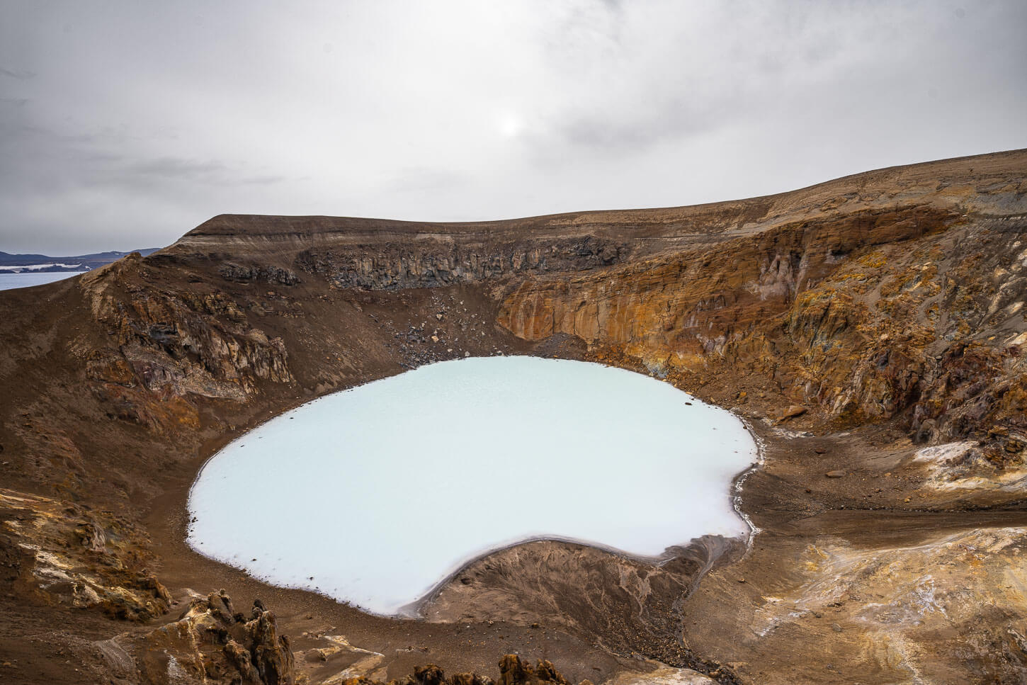 Milky waters of the small geothermal lake in the viti crater