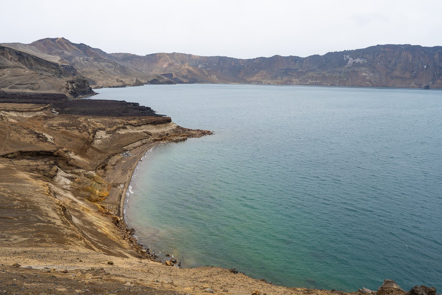 View of Lake Askja and its caldera walls around it.