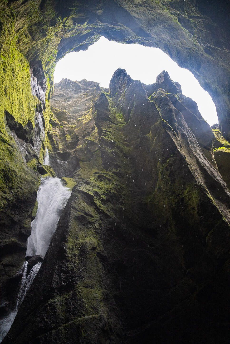 Waterfall in a cave in the Stakkholtsgjá Canyon in Þórsmörk