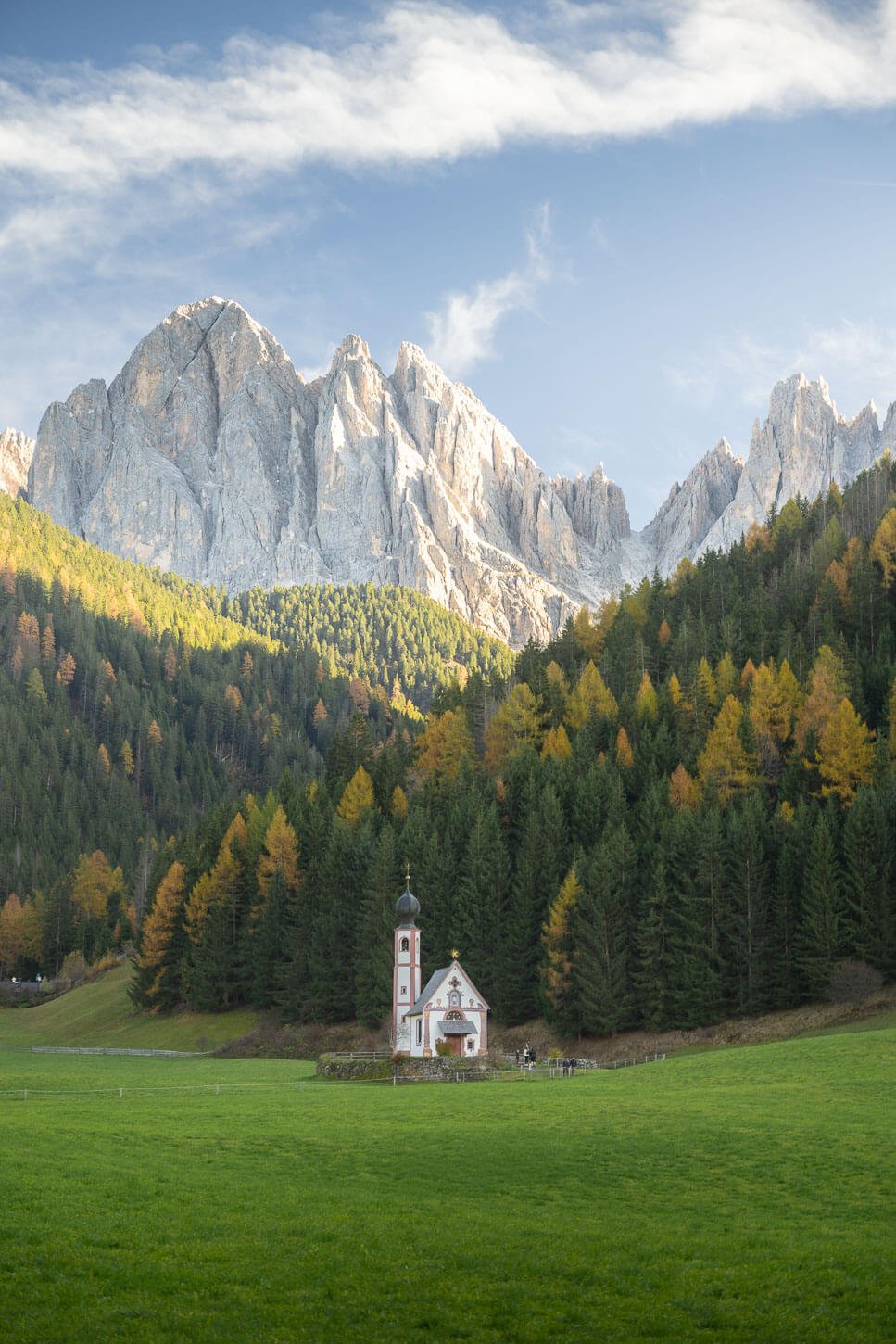 View of St. John's in Ranui Church on a late afternoon in Autumn, one of the most popular photo Spots in the Dolomites.