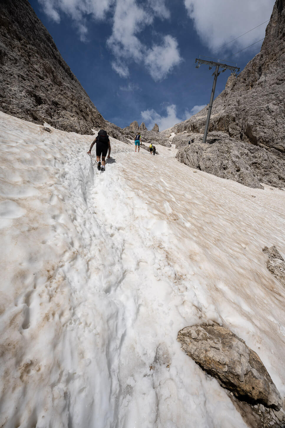 Mountain trail covered in snow in the Dolomites