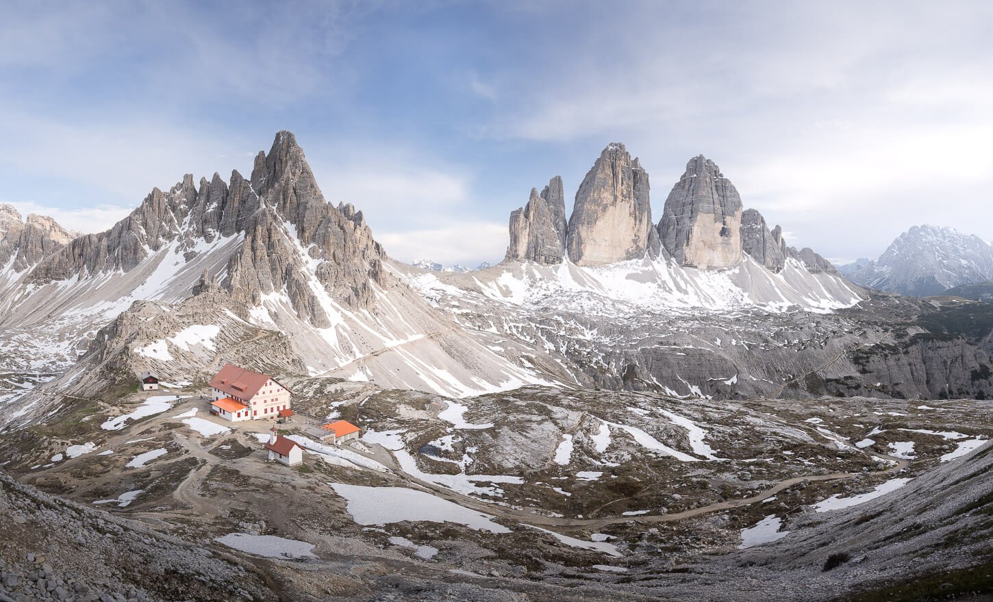 Panoramic view of Le Tre Cime di Lavaredo and Rifugio Locatelly, one of the best locations to hike and one of the best photo spots.