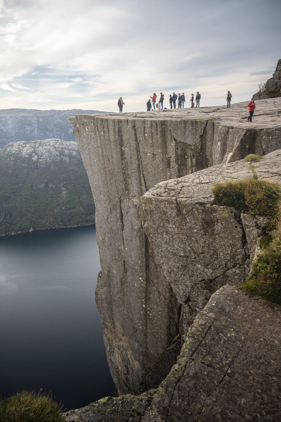 People standing on top of the Pulpit Rock or Preikestolen at the end point of the Hike.