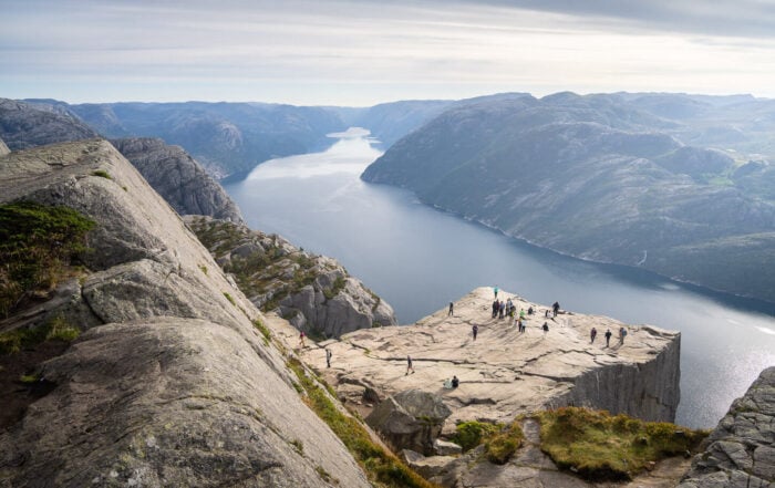 View of Preikestolen from above during a hike, with Lysefjord in the background.the