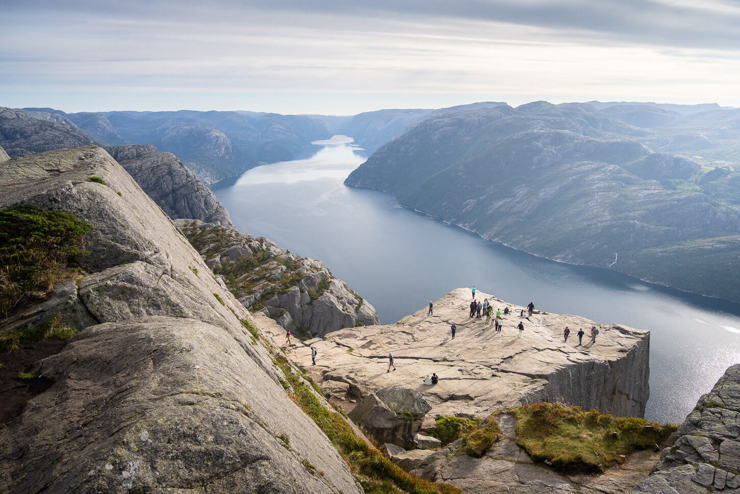 View of Preikestolen from above during a hike, with Lysefjord in the background.the