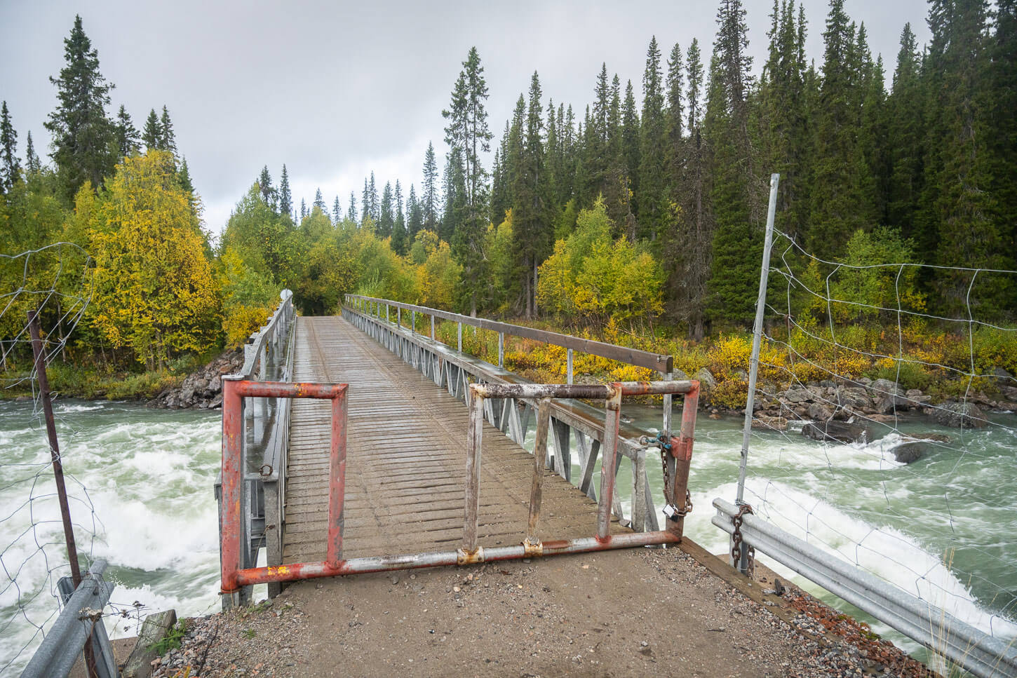 Bridge across a river in Swediash Lapland, trailhead of the Hike to the Aktse Hut and Skierfe.
