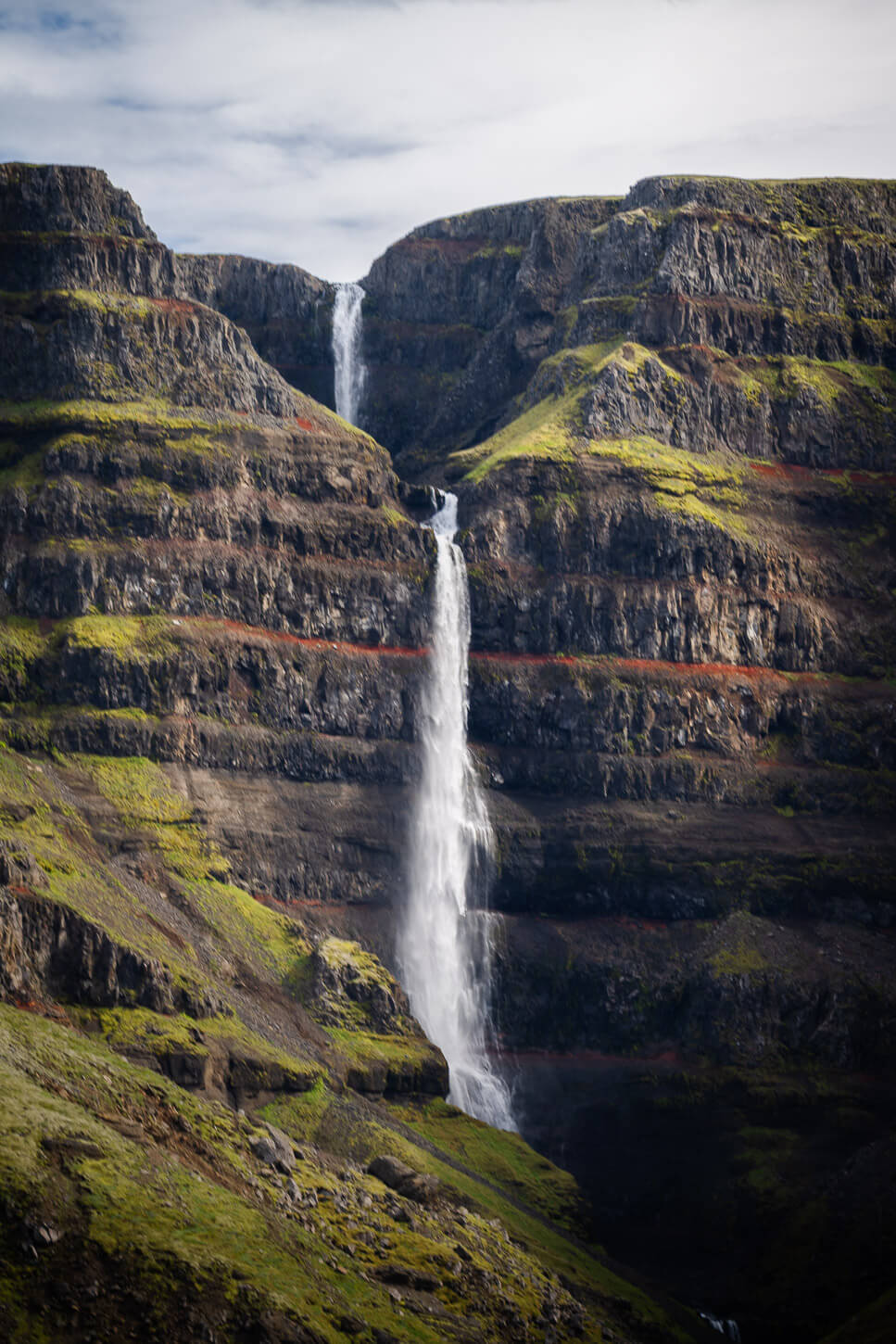 Image of a two0-steps waterfall in east Iceland Called Strutsfoss.