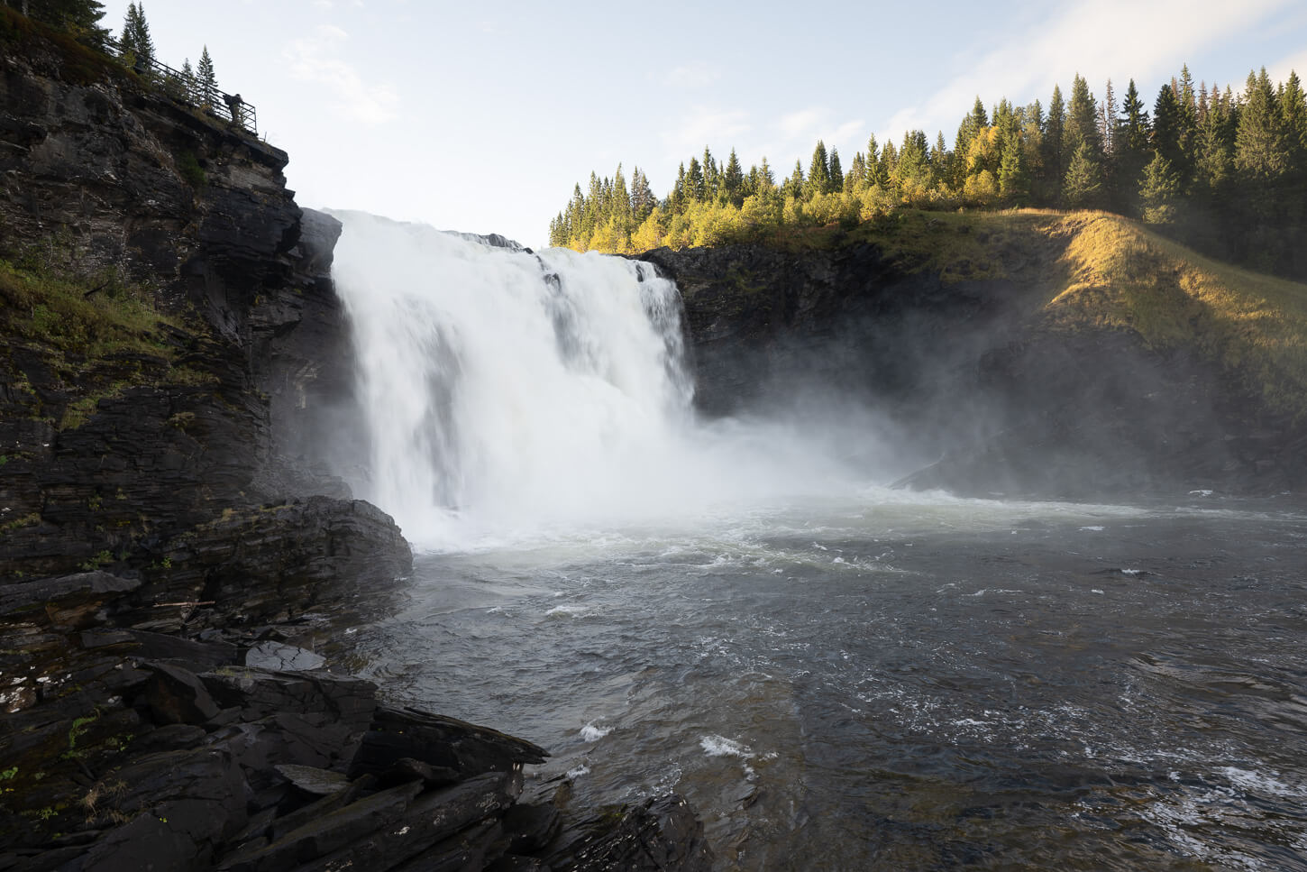 Tannforsen Waterfall viewpoint along the river bank.