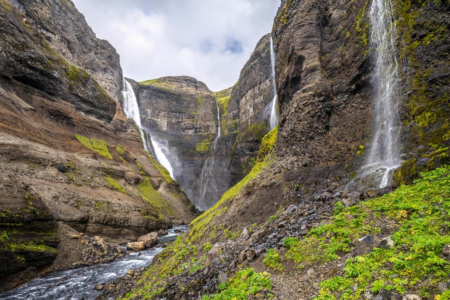 Epic View of the waterfalls cascading in the gorge below Haifoss with Granni partly visible in the background.