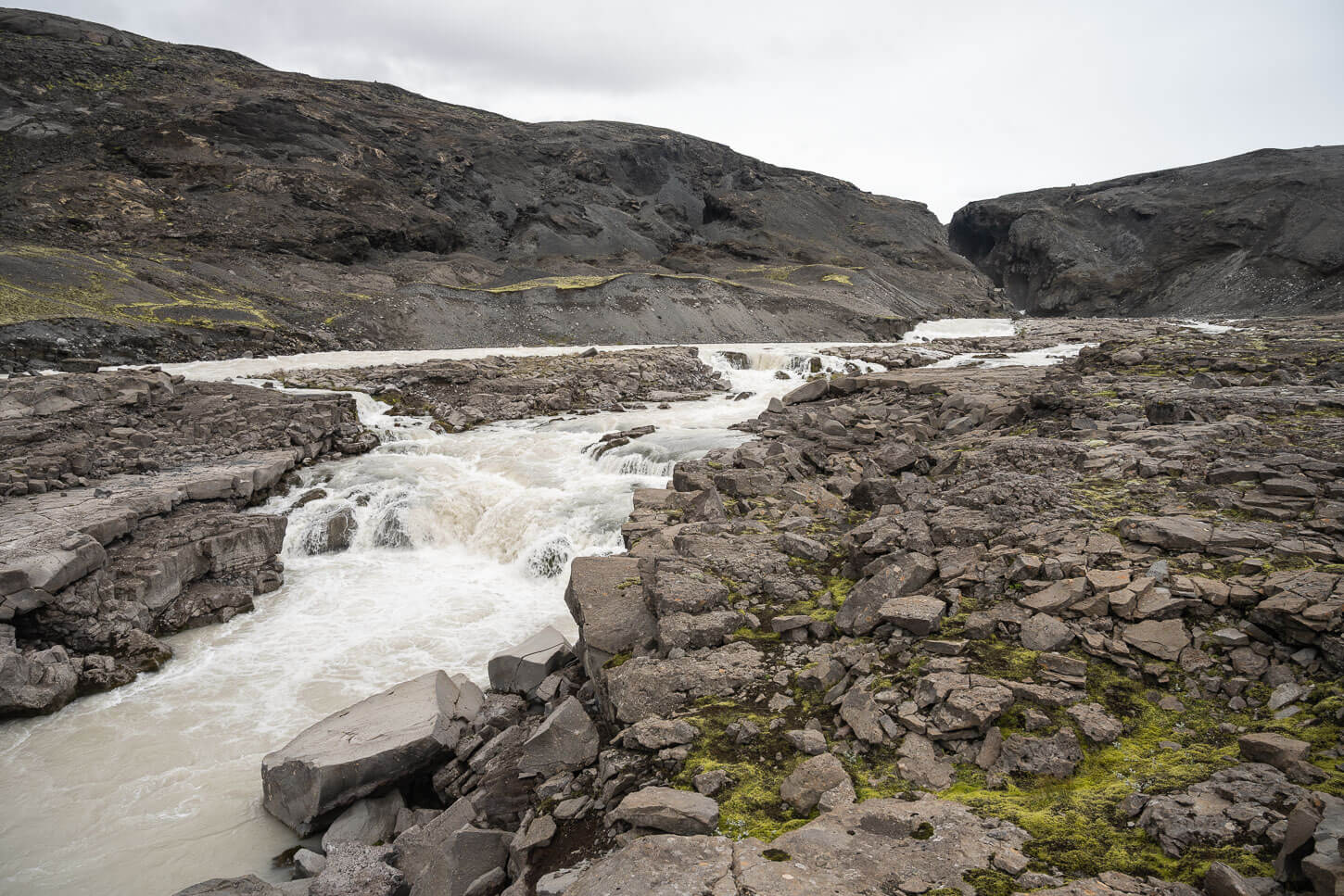 River in the barren landscape of the Icelandic highlands