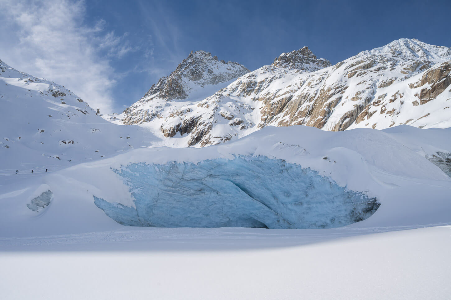 Glacier in Winter above the Furkapass and below the jagged peaks of the Uri Alps.