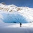 Sidelengletscher view with a hiker on snowshoes in front of the glacier