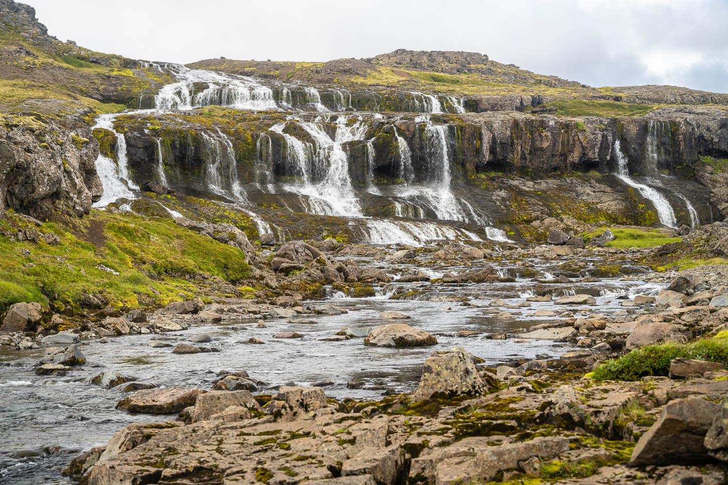 Húsárfoss a multi-step waterfall in the Westfjords of Iceland