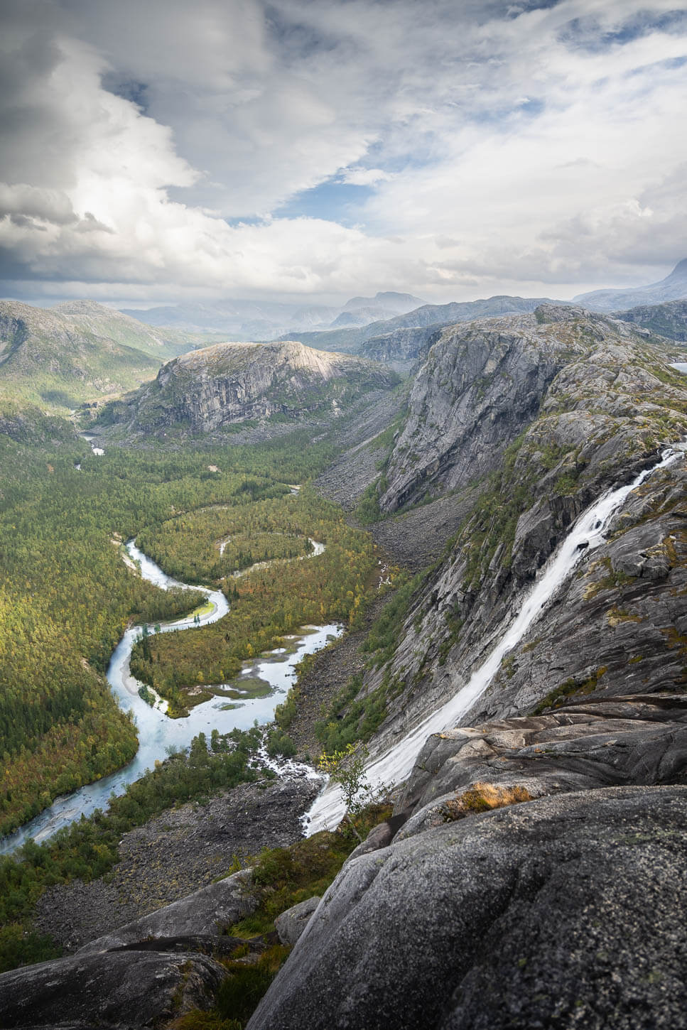 Litlverivassfossen Waterfall in the rago national park with the view of a meandering river in adrmagtic but beautiful landscape.