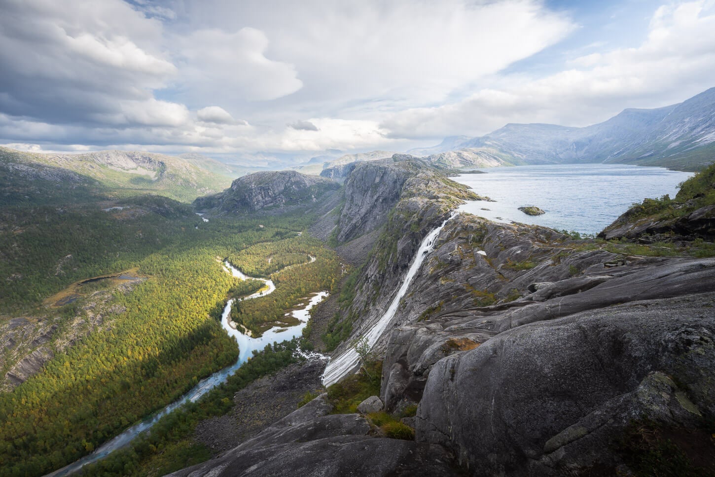 Litlverivassfossen Waterfall viewpoint from a hike there, with an epic view of the Waterfallfalling more than 200 meters into the valley below.