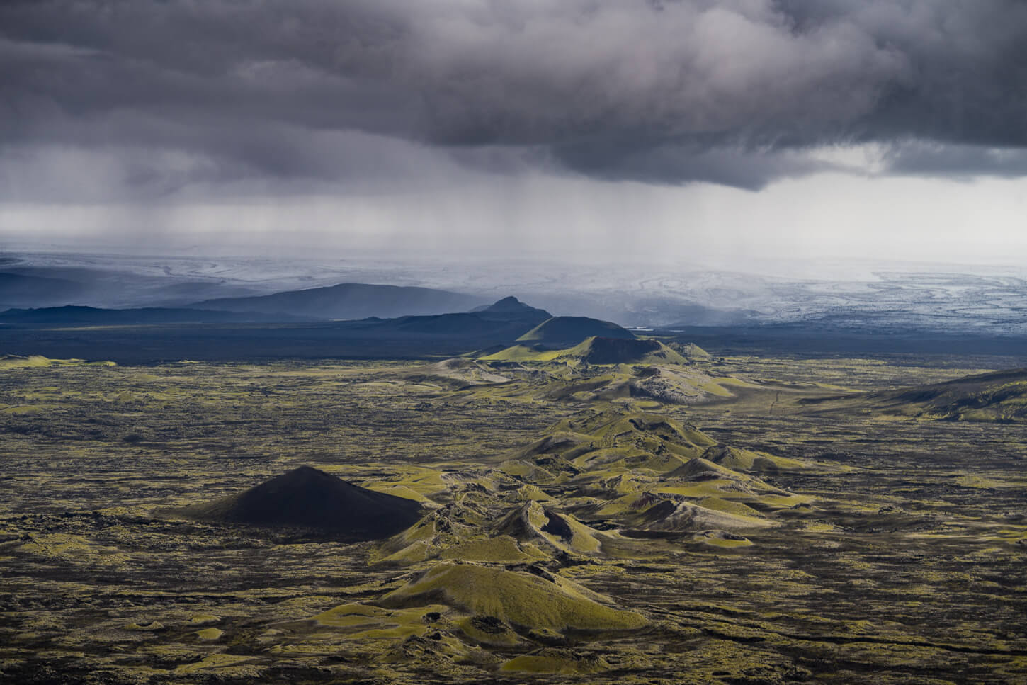 Rain sweeping across the landscape around the Laki Craters or Lakagígar area