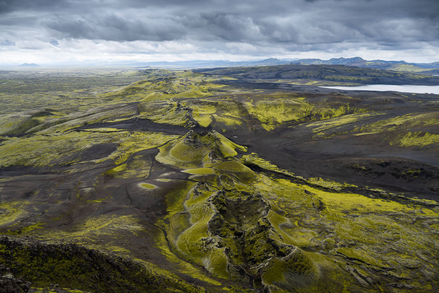 Laki craters viewed from above, in a landscape covered in greem moss.